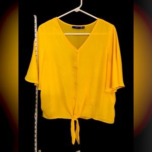 Yellow blouse. Size small. Apt 9